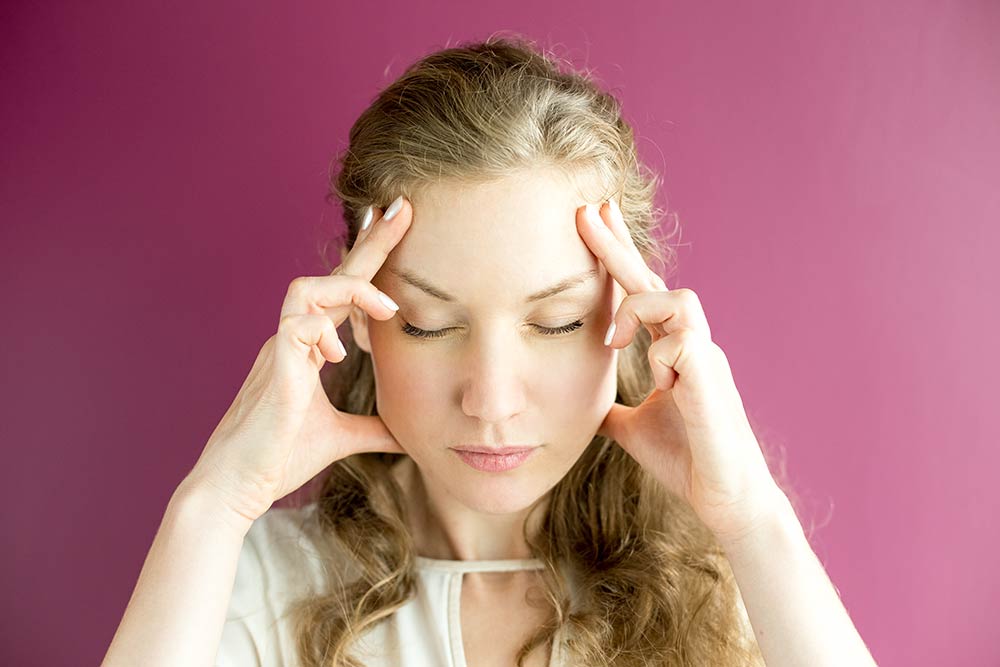 Terapia de puntos de presión para aliviar los dolores de cabeza